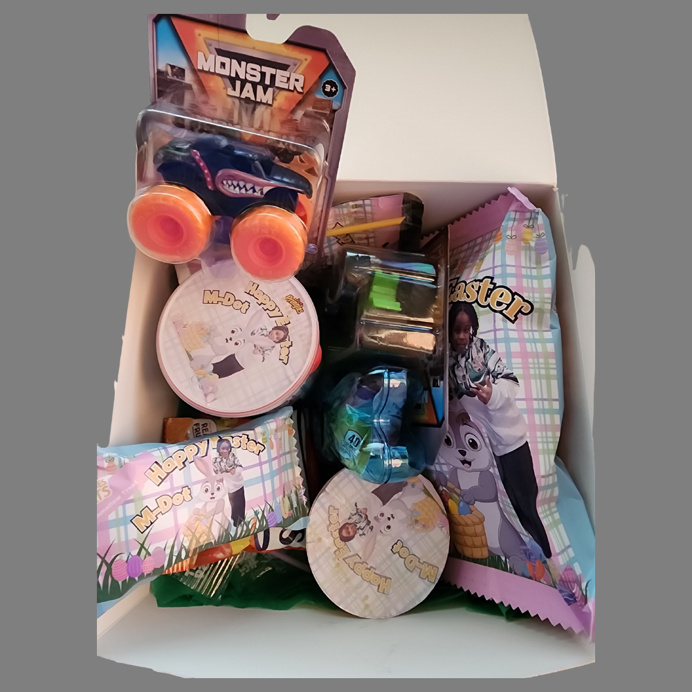 Box of assorted toys with Monster Jam branding