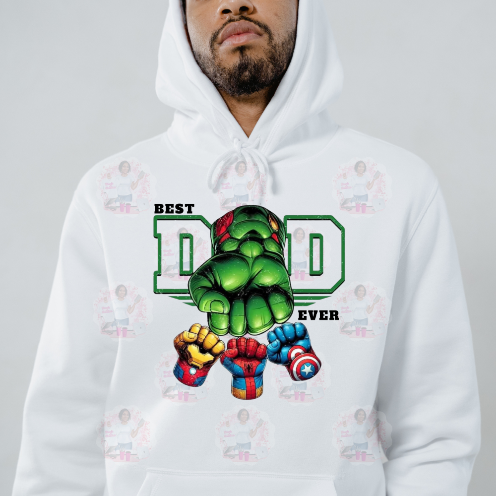 A person wearing a Hoodie with a graphic design of a superhero character and the text 'BEST DAD EVER'.