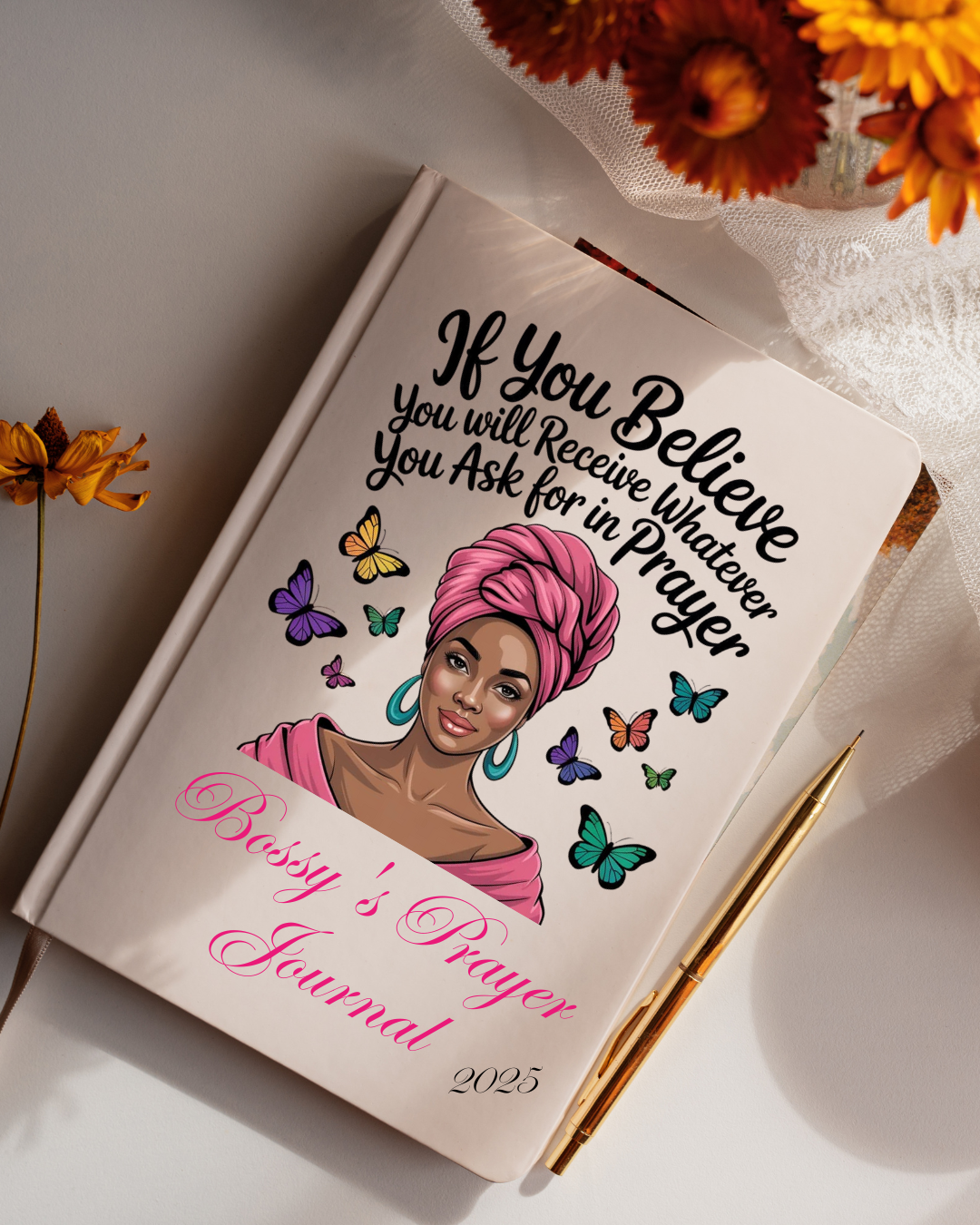 A Prayer Journal with a colorful illustration of a woman on the cover, surrounded by butterflies. The title 'If You Believe' is visible on the cover, along with the name 'Joann'.