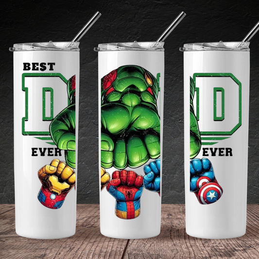 A set of three stainless steel tumblers with superhero-themed graphics, each featuring a character from a popular comic book. The tumblers are white with the text 'BEST DAD EVER' on them.